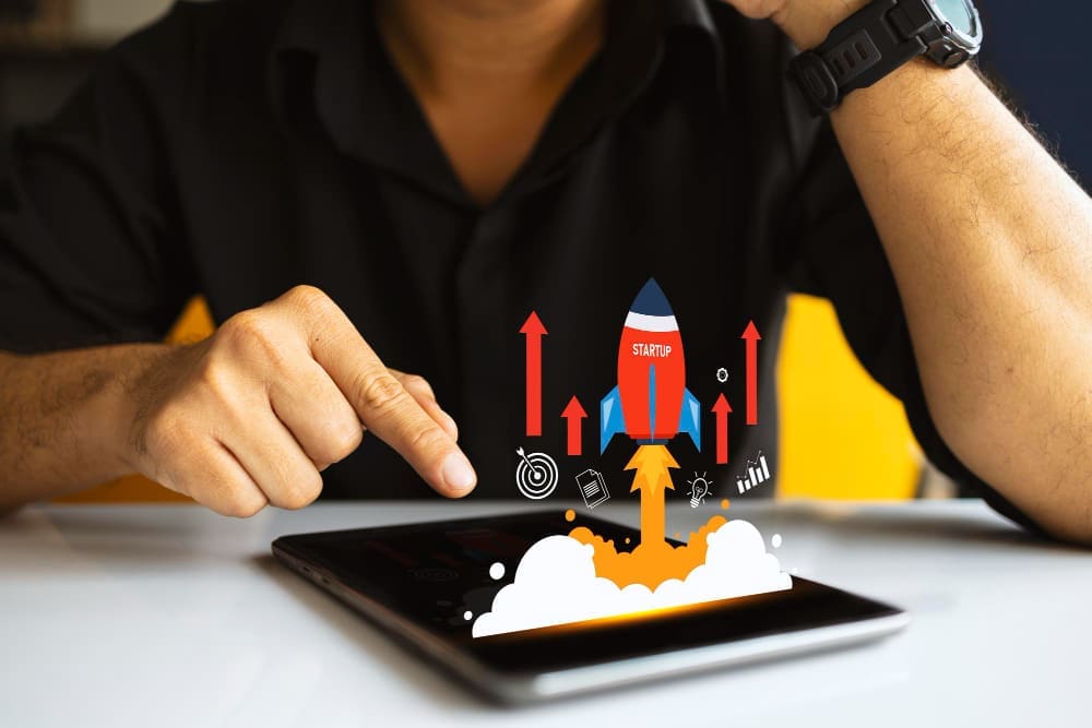 Businessman with a tablet developing strategies for accelerated growth and success
